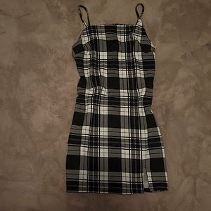 This is a large (11-13)black and white dress